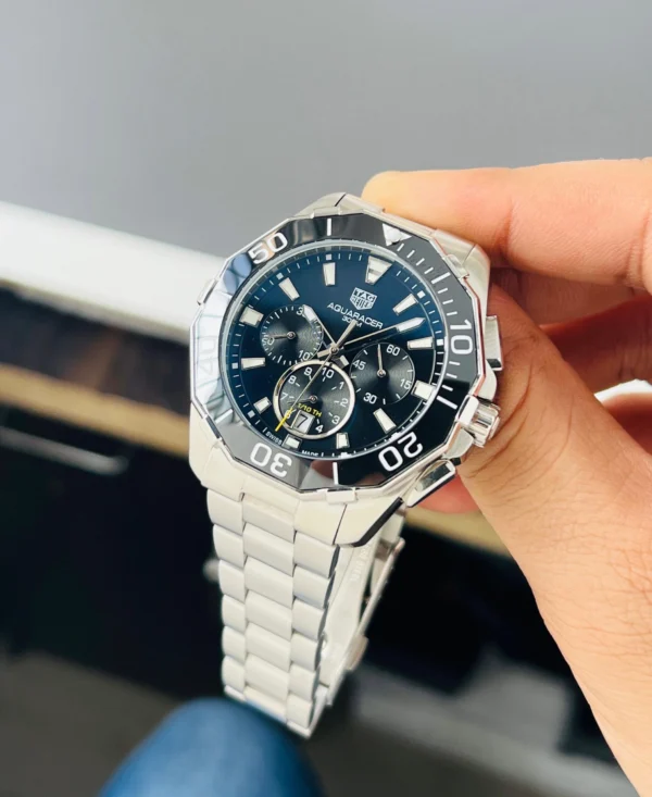 Brand Tag Heuer (7AAA First Copy) Model Aquaracer Calibre 5 Dial Size 45mm Dial Color Black Movement Type Japanese Quartz Display Type Analog with Chronograph Strap Material Stainless Steel